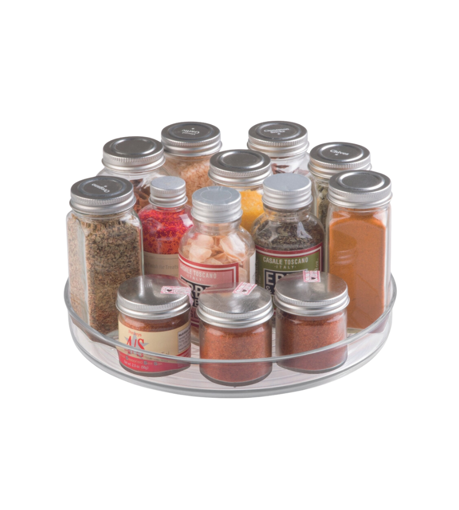 Draaiplateau met kruidenpotjes, gevuld met oregano, paprikapoeder en andere kruiden.