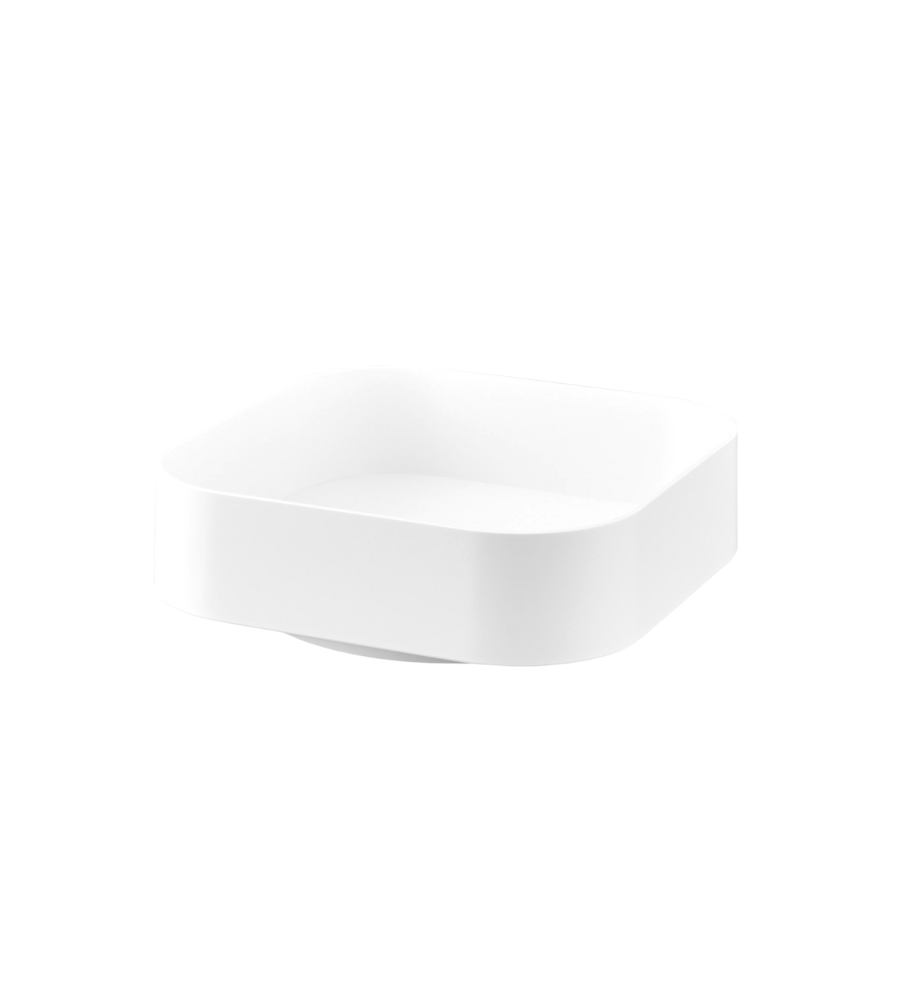 De YAMAZAKI TOWER draaiplateau Lazy Susan in wit (20x20x6,3 cm) valt op door zijn minimalistische, vierkante keramische ontwerp met afgeronde hoeken, ideaal voor het bewaren van voorraad, afgebeeld op een eenvoudige lichtgrijze achtergrond.