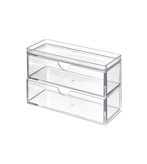De iDesign HOME EDIT - Cosmetica-organizer TRANSPARANT met lade, een doorzichtige, rechthoekige organizer met twee uittrekbare laden, ideaal voor smalle planken, staat tegen een witte achtergrond.