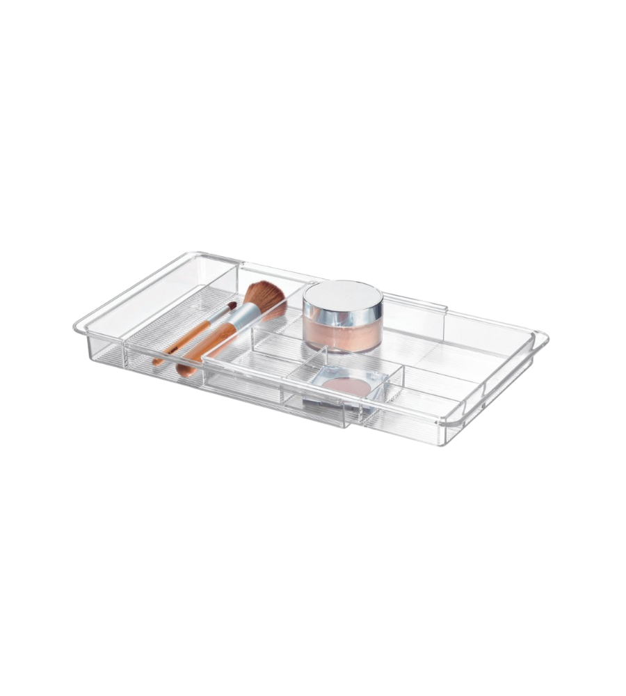 Doorzichtige opbergdoos met vakjes voor make-upproducten, op een witte achtergrond.