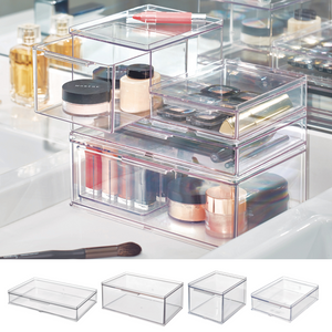 De iDesign HOME EDIT modulaire organizer met lade – diverse maten – biedt transparante opbergruimte voor lippenstift, poeder, kwasten en potjes op het badkamerrek. Hieronder zie je vier aparte, modulaire organizers met lade.