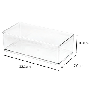 Doorzichtige plastic doos in de lege ruimte, afmetingen: 12,1 cm lang, 7,9 cm breed, 8,3 cm hoog.