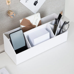Witte bureau-opbergdoos om je mobiel, pennen en notitieblokken op je bureau te bewaren.